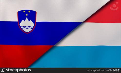 Two states flags of Slovenia and Luxembourg. High quality business background. 3d illustration. The flags of Slovenia and Luxembourg. News, reportage, business background. 3d illustration