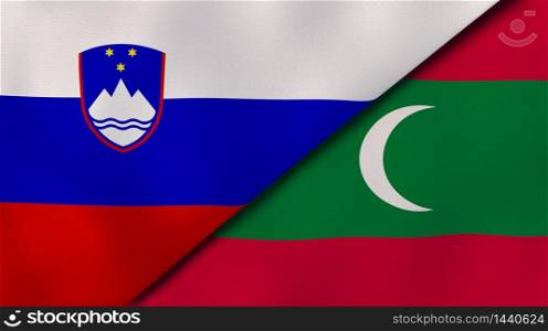 Two states flags of Slovenia and Maldives. High quality business background. 3d illustration. The flags of Slovenia and Maldives. News, reportage, business background. 3d illustration