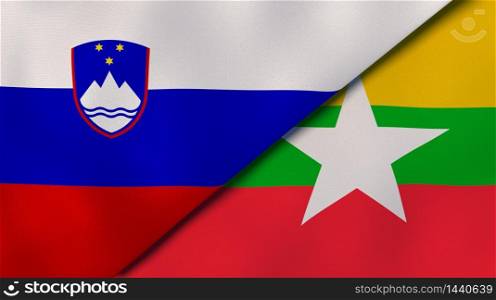 Two states flags of Slovenia and Myanmar. High quality business background. 3d illustration. The flags of Slovenia and Myanmar. News, reportage, business background. 3d illustration