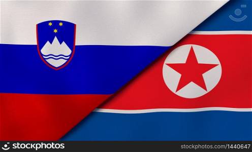 Two states flags of Slovenia and North Korea. High quality business background. 3d illustration. The flags of Slovenia and North Korea. News, reportage, business background. 3d illustration