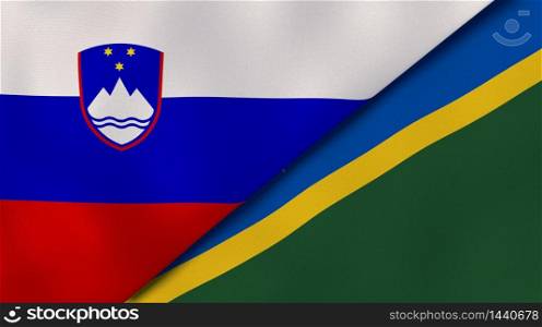 Two states flags of Slovenia and Solomon Islands. High quality business background. 3d illustration. The flags of Slovenia and Solomon Islands. News, reportage, business background. 3d illustration