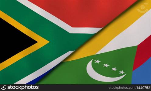 Two states flags of South Africa and Comoros. High quality business background. 3d illustration. The flags of South Africa and Comoros. News, reportage, business background. 3d illustration