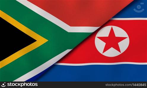 Two states flags of South Africa and North Korea. High quality business background. 3d illustration. The flags of South Africa and North Korea. News, reportage, business background. 3d illustration