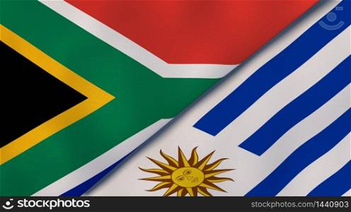 Two states flags of South Africa and Uruguay. High quality business background. 3d illustration. The flags of South Africa and Uruguay. News, reportage, business background. 3d illustration