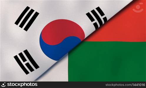Two states flags of South Korea and Madagascar. High quality business background. 3d illustration. The flags of South Korea and Madagascar. News, reportage, business background. 3d illustration