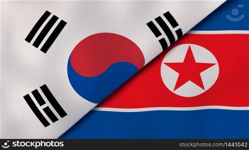 Two states flags of South Korea and North Korea. High quality business background. 3d illustration. The flags of South Korea and North Korea. News, reportage, business background. 3d illustration