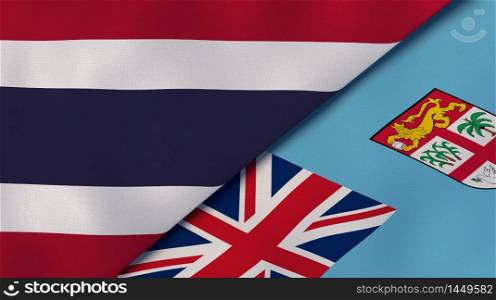 Two states flags of Thailand and Fiji. High quality business background. 3d illustration. The flags of Thailand and Fiji. News, reportage, business background. 3d illustration