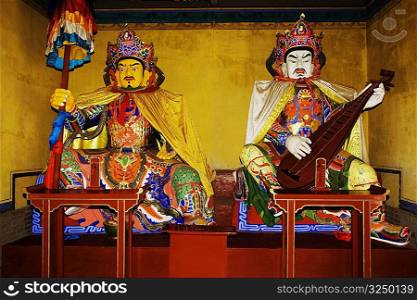 Two statues in a temple, Da Zhao Temple, Hohhot, Inner Mongolia, China