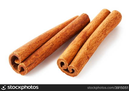 Two sticks of fragrant cinnamon isolated on white background