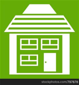 Two-storey house with sloping roof icon white isolated on green background. Vector illustration. Two-storey house with sloping roof icon green