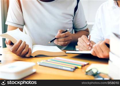 Two student doing homework in university.