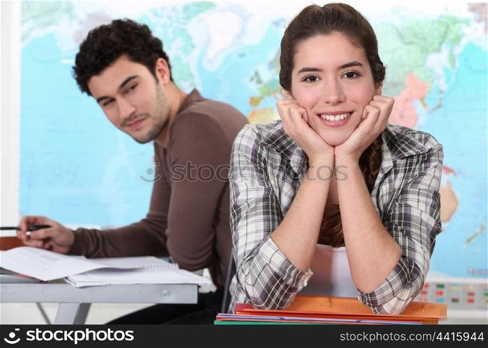 Two students in geography classroom