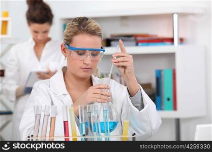 Two students in science class