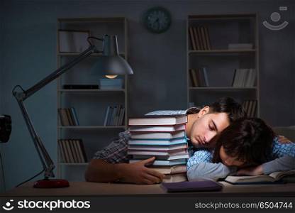 Two students studying late at night