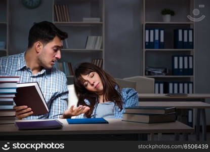 Two students studying late at night