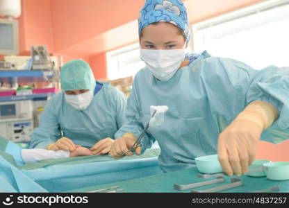 two surgeons in operating room