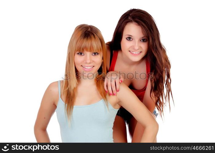 Two teen sisters isolated on white background