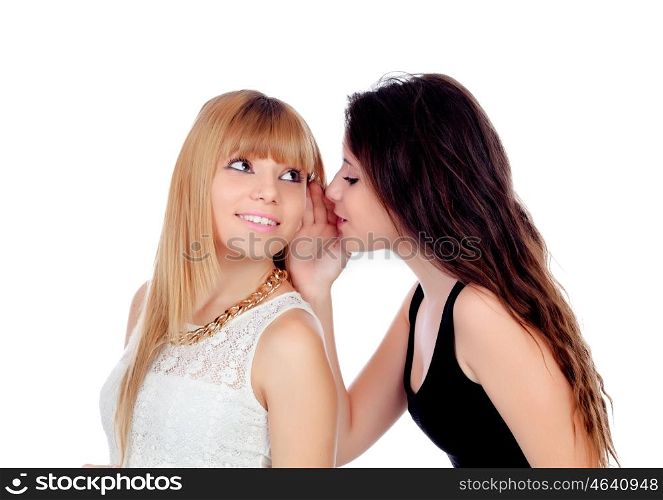 Two teen sisters whispering isolated on white background