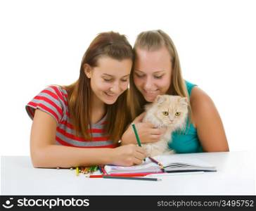 Two teenage girls and a cat paint isolated on white