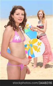 Two teenage girls at the beach
