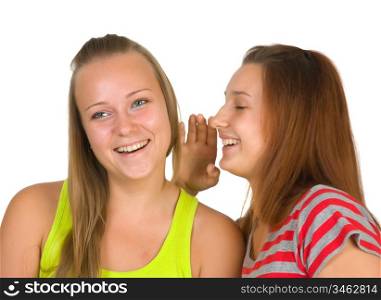 Two teenage girls gossiping isolated on white
