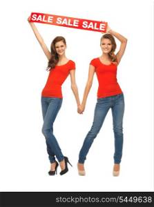 two teenage girls in red t-shirts with sale sign