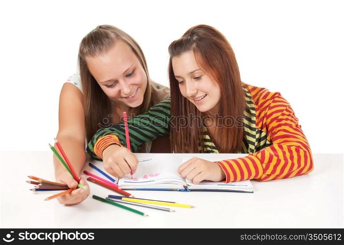 Two teenage girls paint isolated on white background