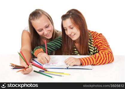 Two teenage girls paint isolated on white background