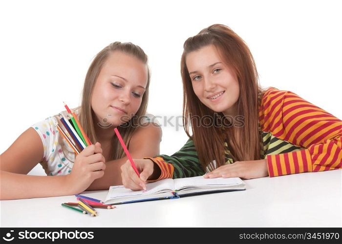 Two teenage girls reading isolated on white