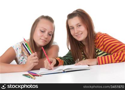 Two teenage girls reading isolated on white