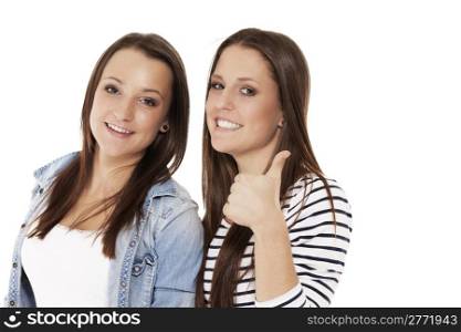 two teenager showing thumbs up. two happy teenager showing thumbs up on white background