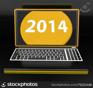 Two Thousand And Fourteen On Laptop Showing New Year Resolution 2014