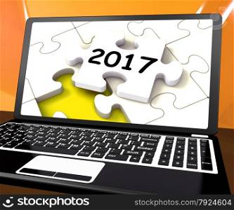 . Two Thousand And Seventeen On Laptop Showing New Years Resolution 2017