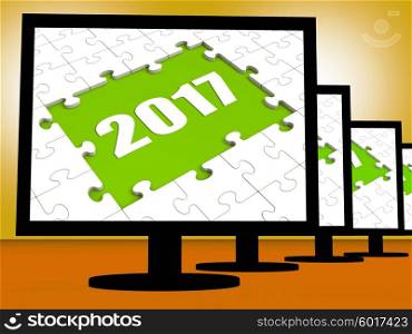 Two Thousand And Seventeen On Monitors Showing Year 2017 Resolution