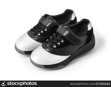 Two-tone black and white leather shoes on white with clipping path