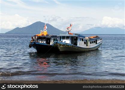 Two tourist boats near beach of Krakatau in Indonesia