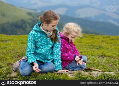 two tourist girls and mountain views. Carpathians, Ukraine. beautiful landscape