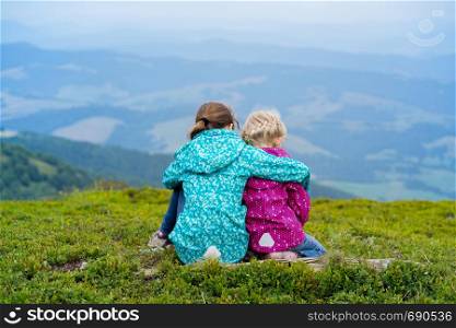 two tourist girls and mountain views. Carpathians, Ukraine. beautiful landscape