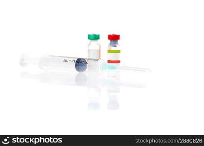 two vial with medicine and syringe