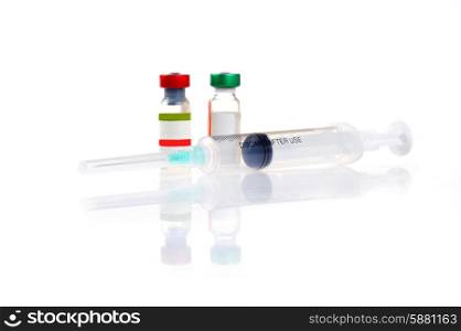 two vial with medicine and syringe