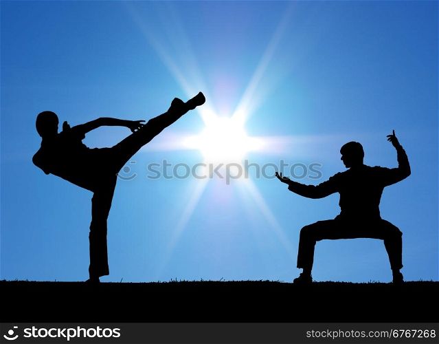Two warrior silhouettes on the sun background.