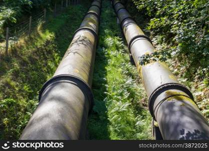 Two water pipes. The pipeline carries water from Coedty reservoir the Dolgarrog hydro electric power station