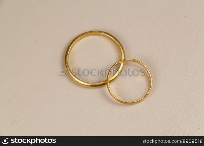 Two wedding rings of different sizes made in gold