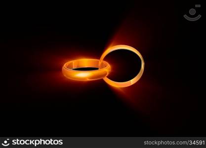 Two wedding rings on a black background. Used a glow effect.