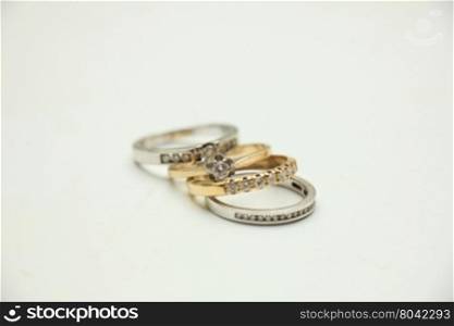 Two wedding sets, one in yellow gold, one in white gold for a double bride wedding