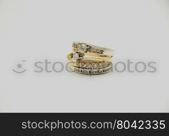 Two wedding sets, one in yellow gold, one in white gold for a double bride wedding