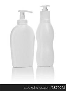 two white cosmetical bottles isolated