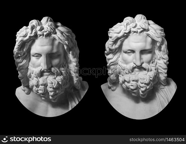 Two white gypsum copy of antique statue of Zeus head for artists isolated on a black background. Plaster sculpture of man face with beard. Zeus the ancient Greek god.. Two gypsum copy of antique statue Zeus head isolated on black background. Plaster sculpture man face with beard.