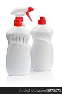two white kitchen bottles and white spray with red handle