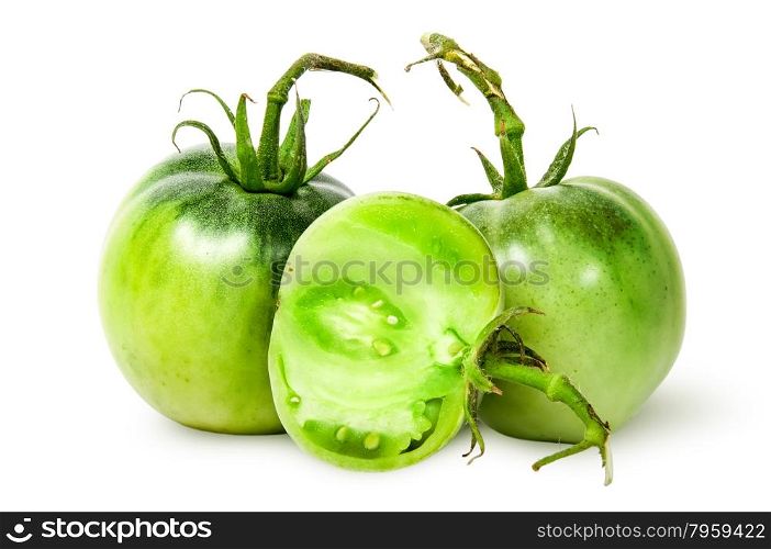 Two whole and half green tomatoes isolated on white background